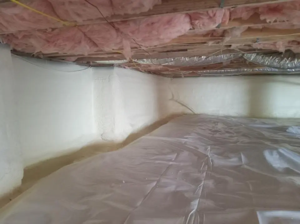 Crawl space encapsulation with closed-cell spray foam for Commercial Roof Restoration in Lawrenceburg